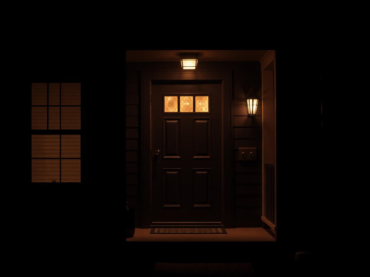 San Diego domestic violence defense attorney: quiet residential porch at night where a domestic violence call may originate